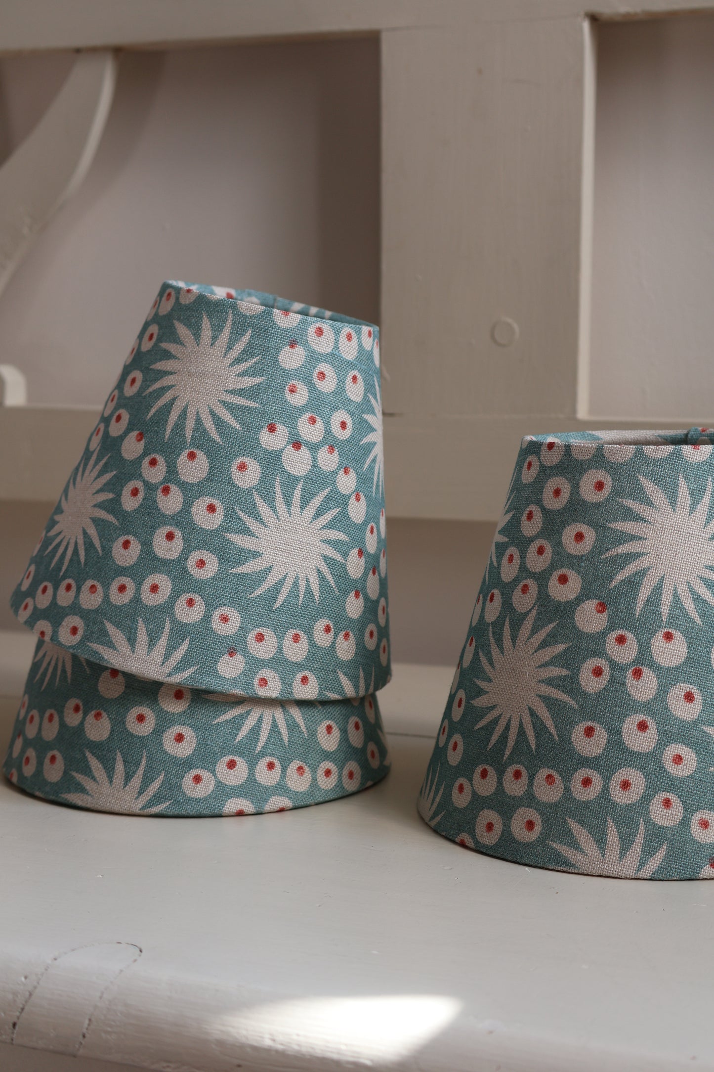 Small-batch handmade linen lampshade with blue pattern, ideal for wall lights, chandeliers, and bedside tables
