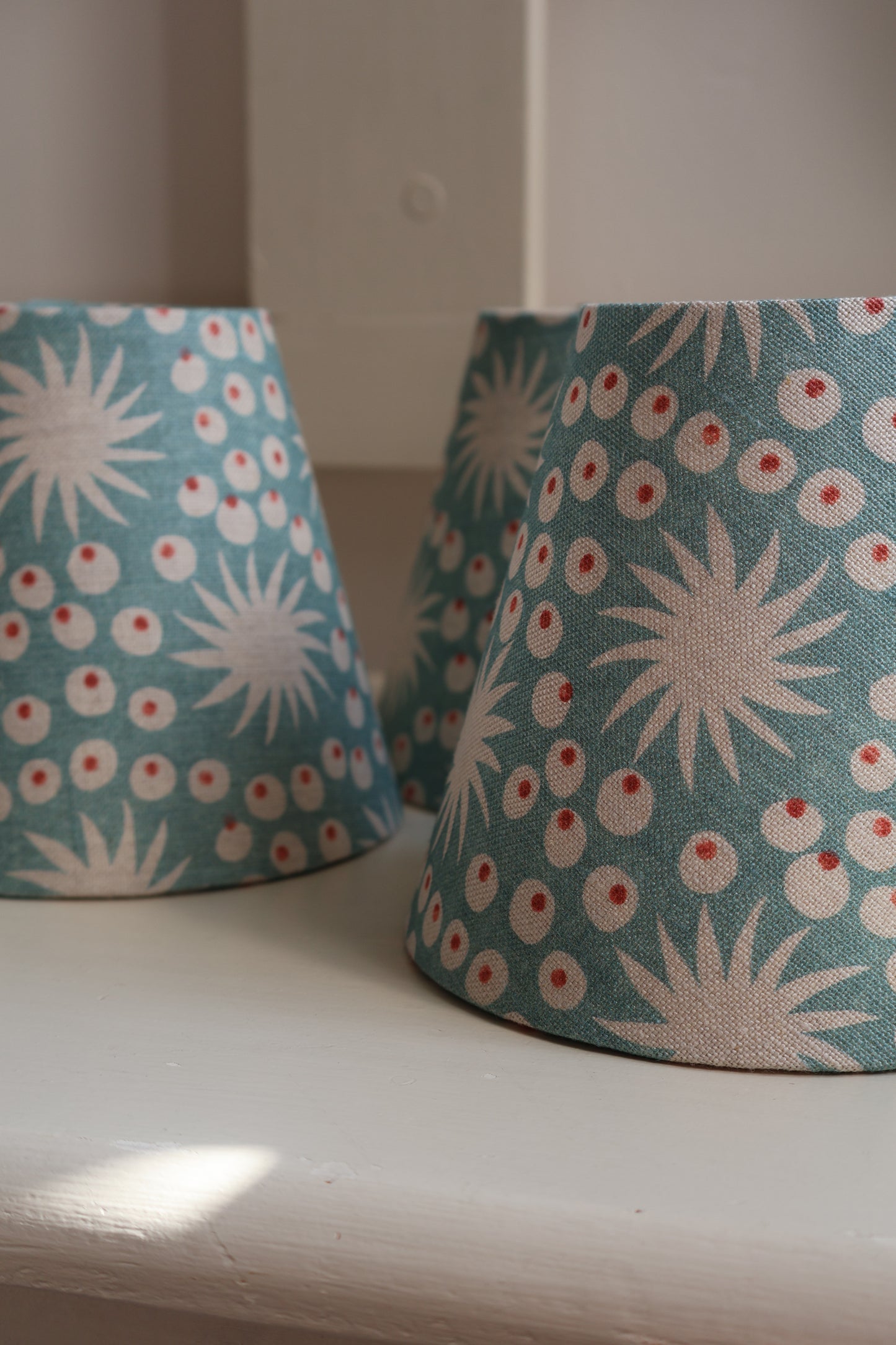 Small-batch handmade linen lampshade with blue pattern, ideal for wall lights, chandeliers, and bedside tables